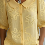 Milena | Elegantna bluza sa cvetnim detaljem