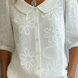 Milena | Elegantna bluza sa cvetnim detaljem